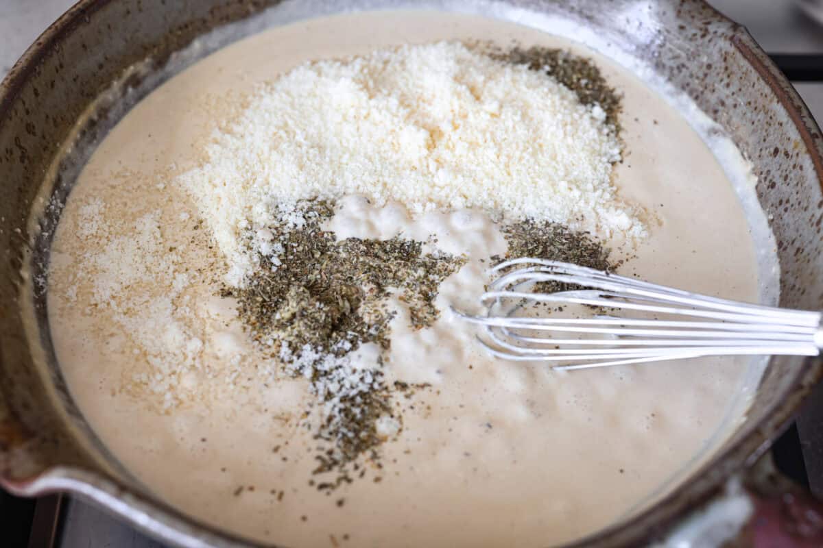 I'm excited for you guys to try this cream cheese chicken. It's an easy one-pan dinner with a rich, creamy sauce that delivers pure comfort food vibes. Itโs quick to make, easy to clean up, and perfect for cozying up on a busy night. Cream cheese, Dijon, seasonings, and parmesan cheese added to the sauce.