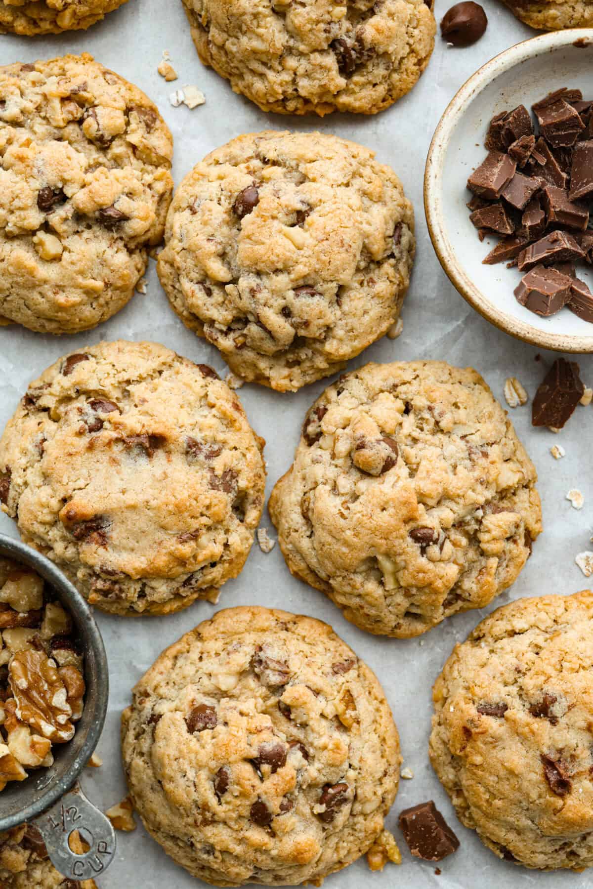 These Neiman Marcus Chocolate Chip Cookies come with a famous backstory, but the real star is the cookie itself. Thick, chewy, and packed with oats, two kinds of chocolate, and crunchy walnuts, theyโre truly worth the hype. Overhead shot of Neiman Marcus chocolate chip cookies baked and read to be eaten!