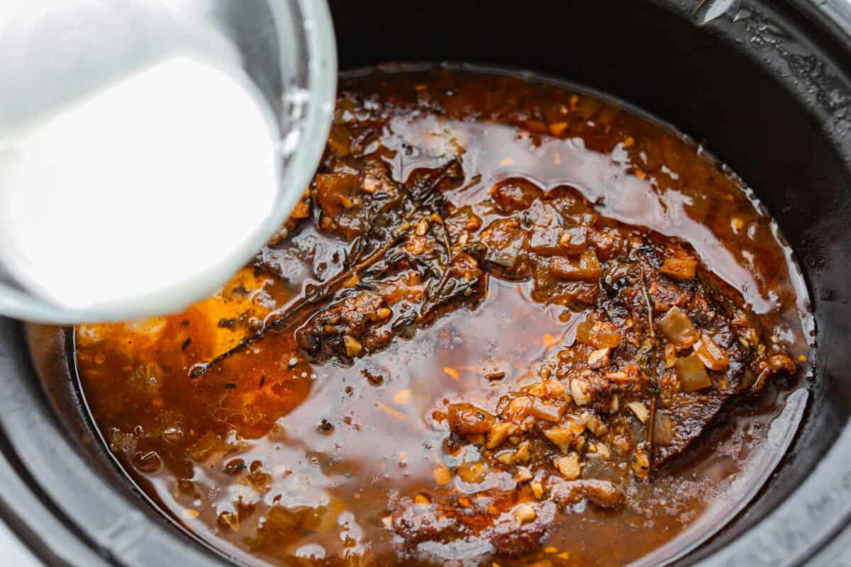 This horseradish pot roast is pure comfort food with a flavorful twist. The beef cooks low and slow until fork-tender, soaking up a rich, savory sauce with just enough horseradish to add depth without being overwhelming. Cornstarch slurry added to the slow cooker to help thicken the sauce.