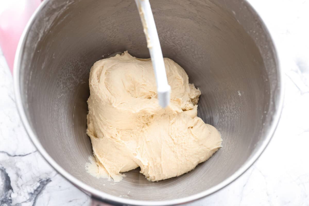 If warm, homemade bread is your weakness, youโre going to love these French bread rolls. Theyโre soft, chewy, and perfect for everything from weeknight dinners to holiday meals. French bread rolls dough ball in the bottom of the bowl of a stand mixer.