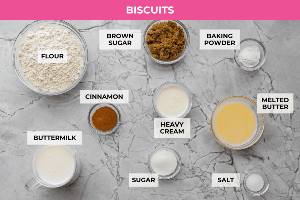 These cinnamon roll butter swim biscuits are my cheat code to making "cinnamon rolls." They bake up soft and fluffy with a sweet cinnamon swirl and icing on top. They disappear almost as fast as you can make them! Overhead shot of labeled cinnamon roll butter swim biscuit ingredients.