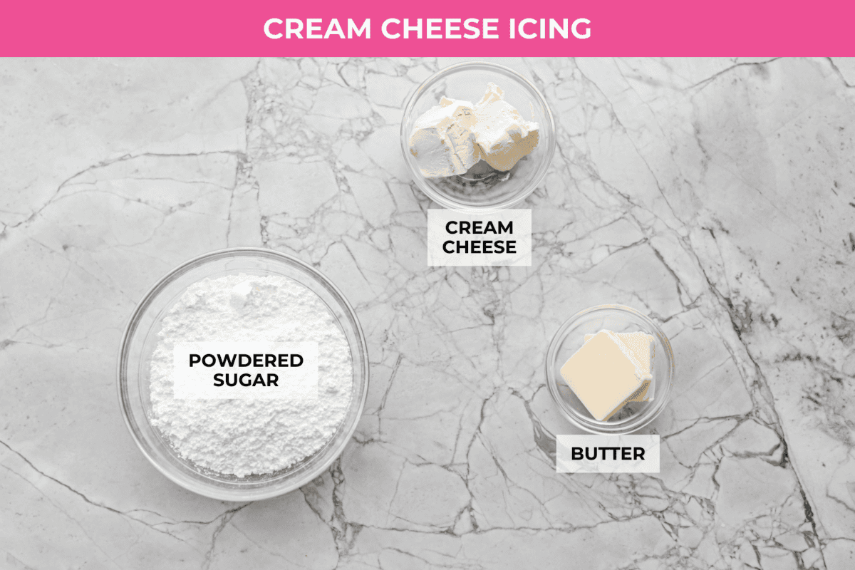 These cinnamon roll butter swim biscuits are my cheat code to making "cinnamon rolls." They bake up soft and fluffy with a sweet cinnamon swirl and icing on top. They disappear almost as fast as you can make them! Overhead shot of labeled cream cheese icing ingredients.