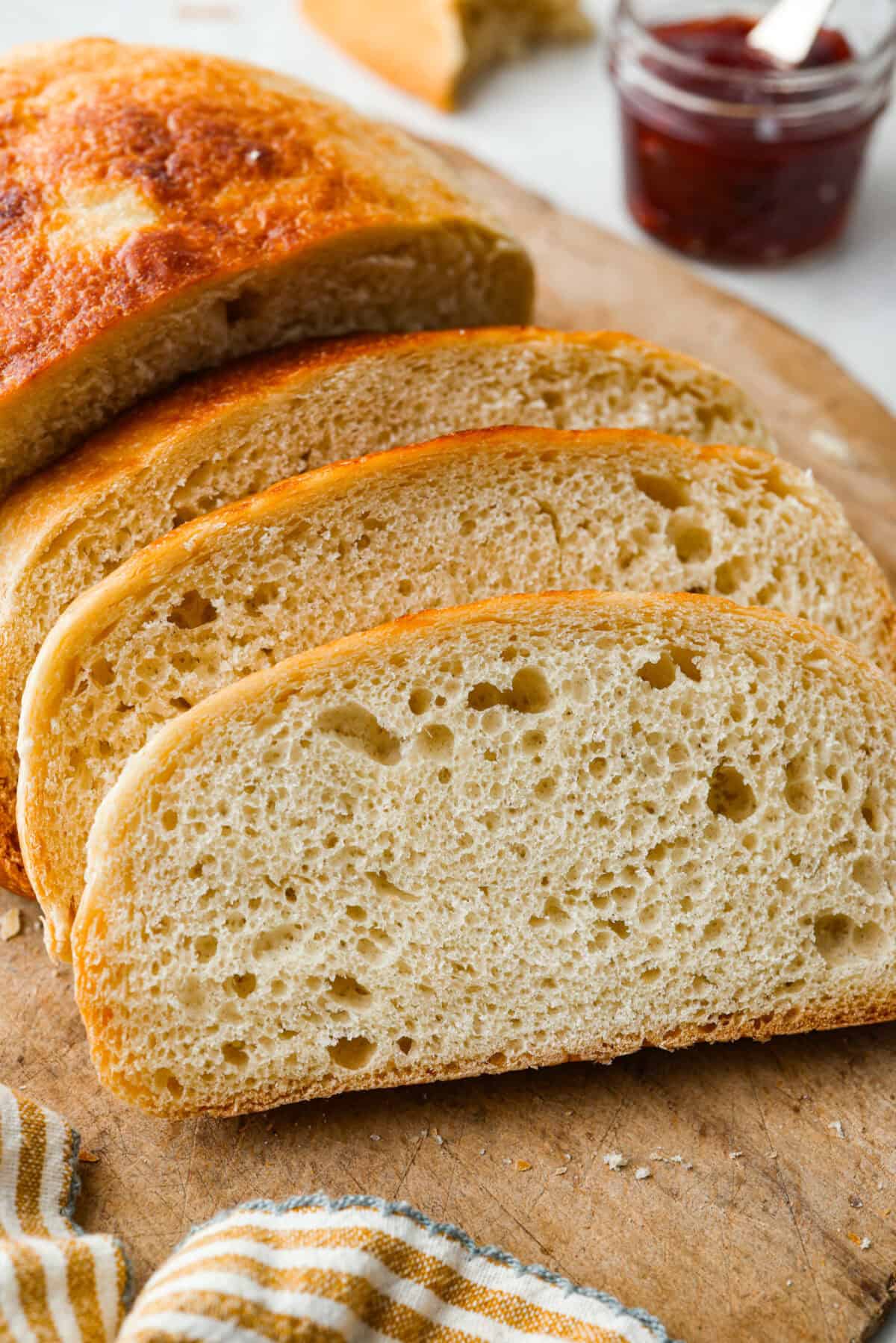 If you’ve ever wanted homemade bread without all the work, this slow cooker bread is my favorite easy trick. As a busy mom, I love that a few simple ingredients and my slow cooker turn into a warm, soft loaf with hardly any effort. Close up of the slow cooker bread slices.