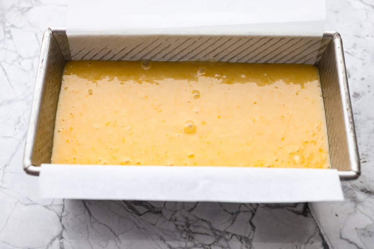 This glazed orange loaf is sunshine in every slice! Fresh orange zest and juice give it a bright citrus flavor. It's just like this incredibly popular Lemon Loaf. It’s the kind of quick bread you keep coming back to for just one more slice. Batter in a loaf pan.