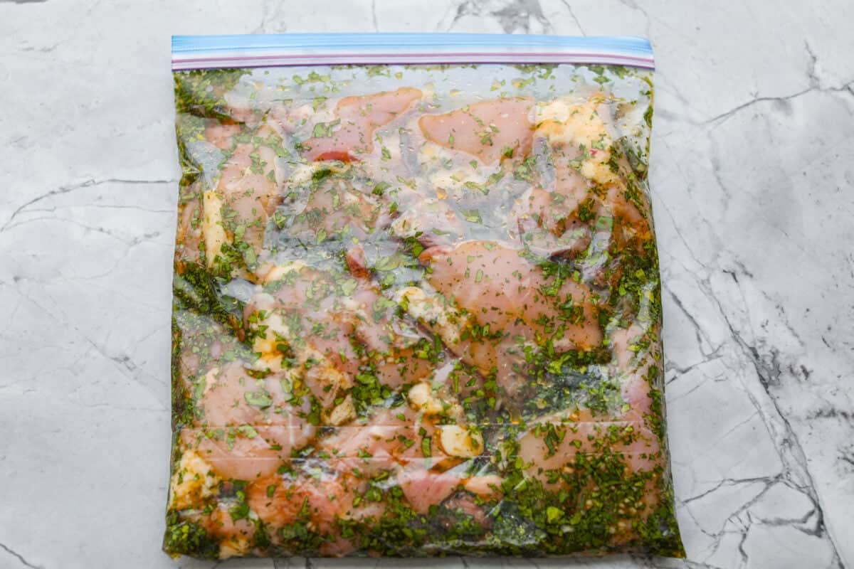 This grilled honey lime cilantro chicken is made for summer nights. It’s fresh, a little sweet, a little tangy, and packed with flavor. I make this on repeat when I need something easy that still feels like a real dinner. Chicken thighs added to the marinade in the bag and sealed closed.