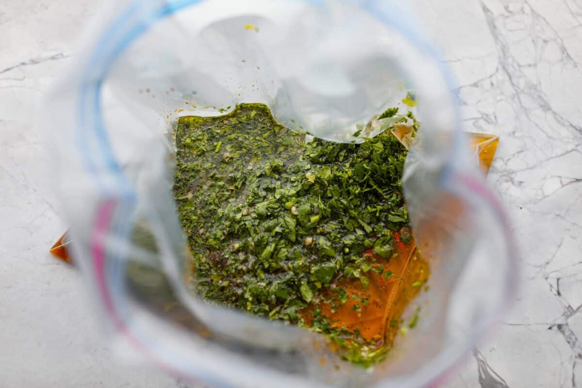 This grilled honey lime cilantro chicken is made for summer nights. It’s fresh, a little sweet, a little tangy, and packed with flavor. I make this on repeat when I need something easy that still feels like a real dinner. All of the marinade ingredients added to a zip lock bag.