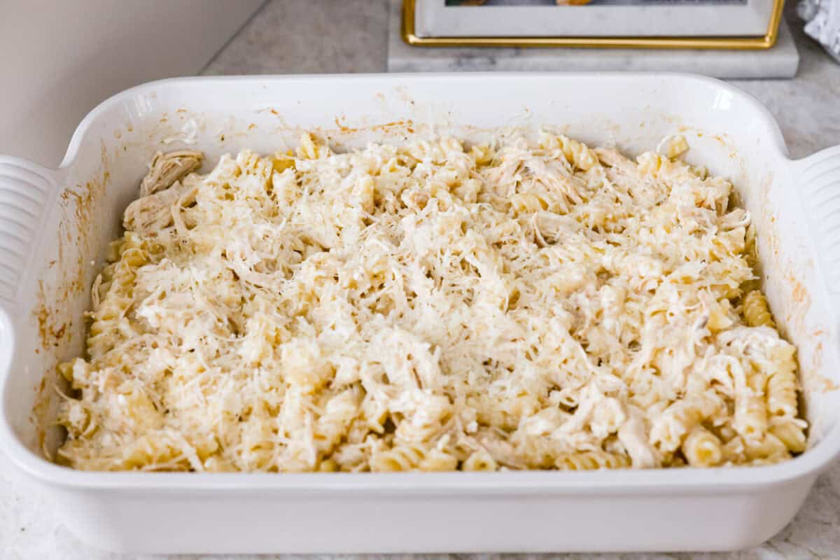 This baked Olive Garden chicken is pure comfort food made easy! It uses Olive Garden Italian dressing and just 5 other ingredients to create a creamy, cheesy pasta bake everyone loves. Quick prep, one dish, and big flavor in every bite! Cheese added to the baked Olive garden chicken to get melted in the oven.