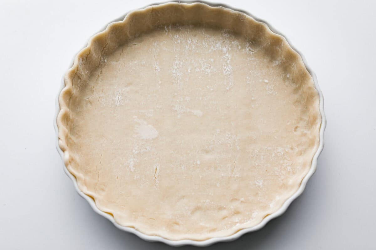 My asparagus quiche is one of those recipes I wait all year to make. Itโs creamy, cheesy, and those bright green asparagus pieces make every slice feel fresh and so good. Itโs simple, itโs pretty, and I love making it for a spring brunch! Pie crust in the bottom of a pie dish.