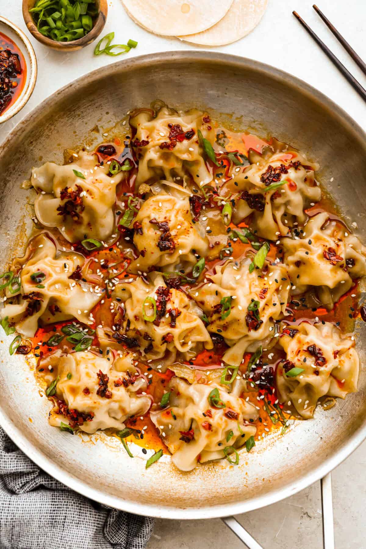 Blanket dumplings are a viral dumpling hack where you cook the filling and press the wrappers right on top. They are the ultimate shortcut to homemade dumplings, ready in just 30 minutes! Trust me, you will want to make these! Pan with no fold blanket dumplings cooked.