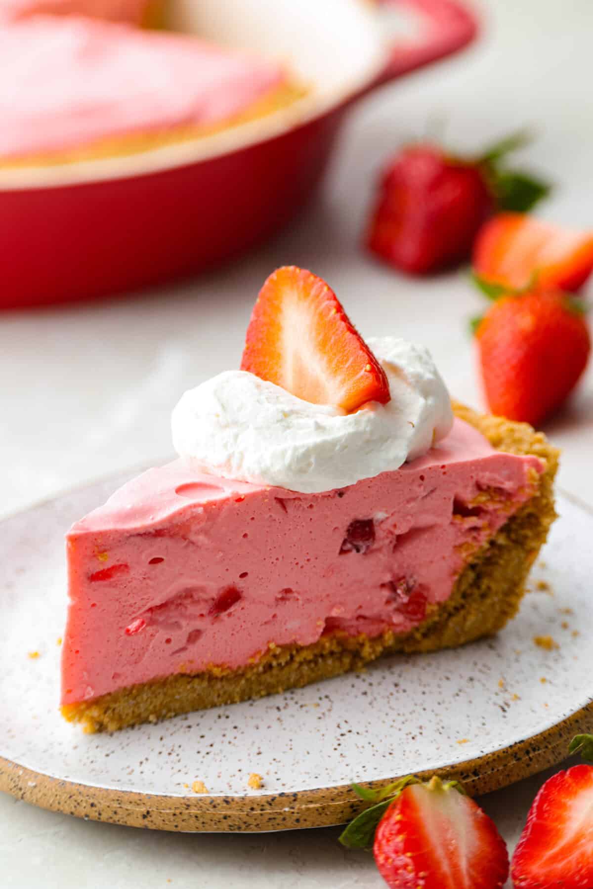 When itโs too hot to even think about turning on the oven, this no bake strawberry cream pie is exactly what you want waiting in the fridge. Itโs cool, creamy, loaded with fresh strawberries, and comes together without heating up your kitchen Slice of no bake strawberry cream pie on a plate.