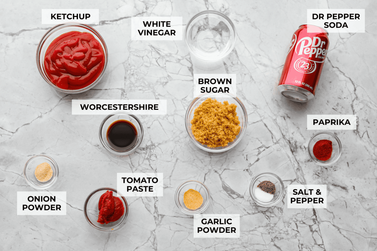 My Dr Pepper BBQ sauce is sweet, tangy, smoky, and seriously addictive! Made with simple ingredients and Dr Pepper for aย rich caramelized flavor. Itโs perfect for all your BBQ sauce needs! Overhead shot of labeled ingredients.