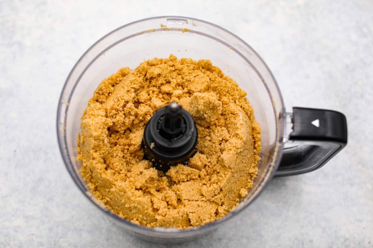 Orange creamsicle lush is sunshine in dessert form! With creamy orange layers, a buttery golden Oreo crust, and bright fresh citrus flavor, this easy no-bake dessert is a fun twist on my popular Lemon Lush thatโs perfect for summer. Oreo crumbs mixed up for the cookie crust.