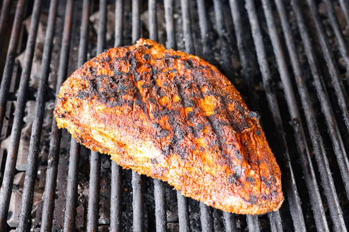 Santa Maria grilled tri-tip is juicy, smoky, and loaded with bold flavor from a delicious spice rub. Grilled until perfectly tender with a gorgeous crust, itโs an easy recipe thatโs always a hit at cookouts and summer dinners. Santa Maria tri tip being seared on the grill.