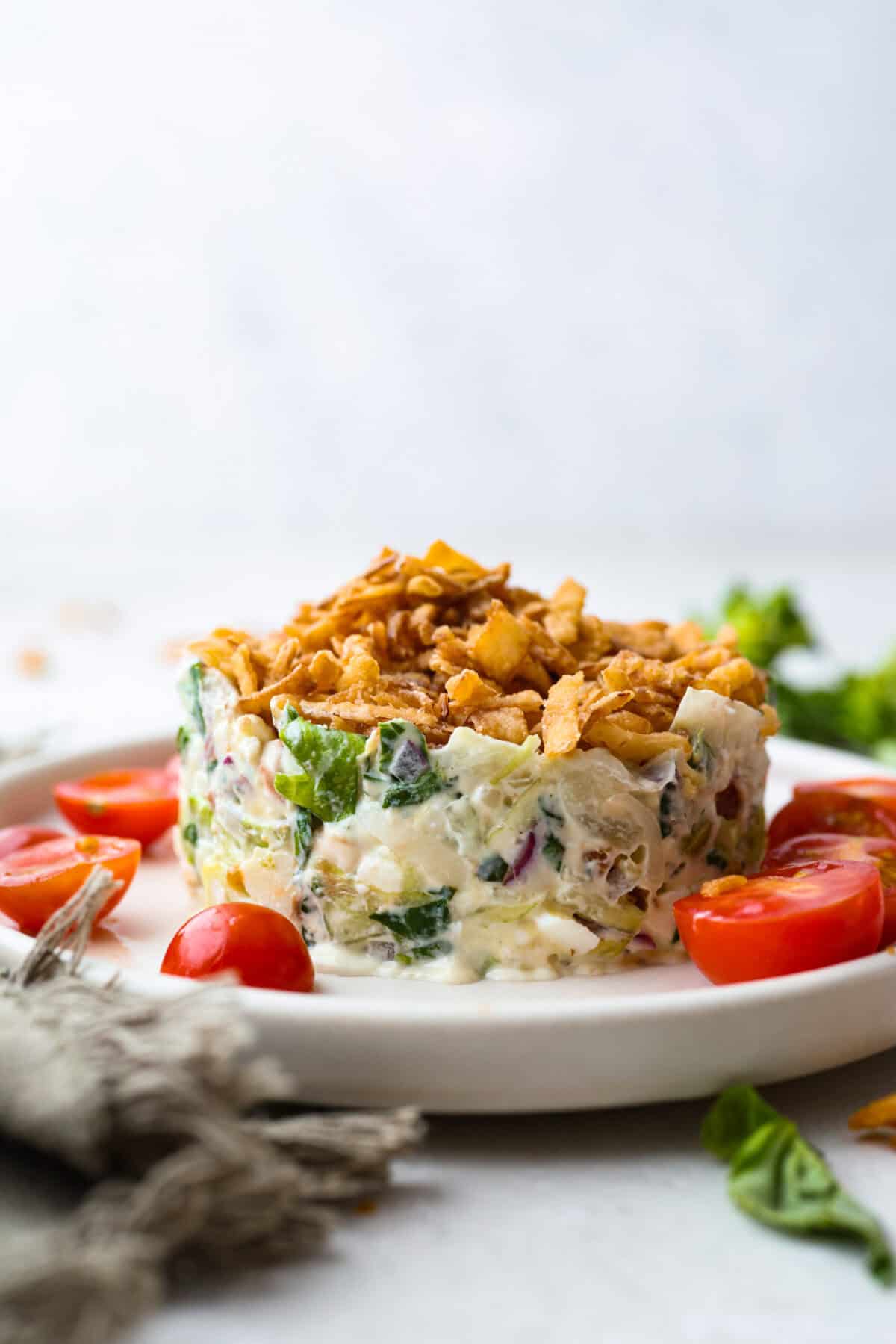 Classic Ruth's Christ salad on a plate in a ring shape like how it's served at the restaurant. 