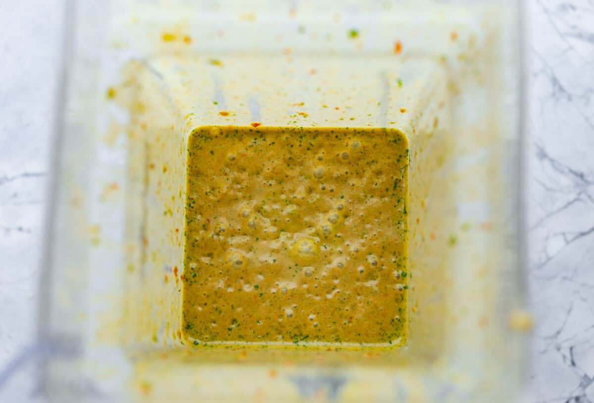 I love salads in the summer, and this grilled shrimp salad is such a good one. Itโs fresh, colorful, and filling without feeling heavy. And the dressing? Oh my gosh. The chipotle-lime flavor is so good, youโll want to pour it on everything. Dressing ingredients blended together in a blender.