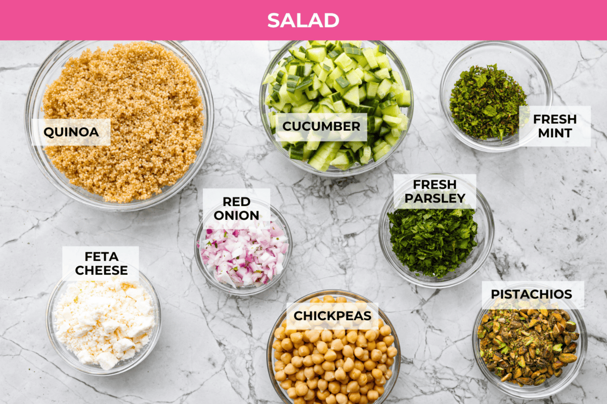 This Jennifer Aniston Salad is light, fresh, and perfect for summer lunches. Itโs packed with veggies, chickpeas, herbs, pistachios, and feta, then tossed in a simple lemon dressing that makes everything taste bright and delicious. Overhead shot of labeled Jennifer Aniston Salad ingredients.