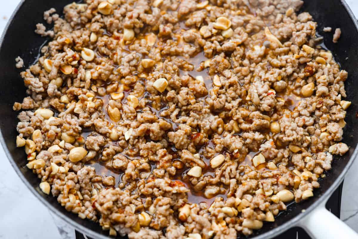 These dragon noodles are the ultimate weeknight dinner when youโre craving big flavor fast. Tender noodles, spicy-sweet sauce, and savory pork come together for a dish thatโs fast, fiery, and seriously addictive. Sauce added to the cooked pork.