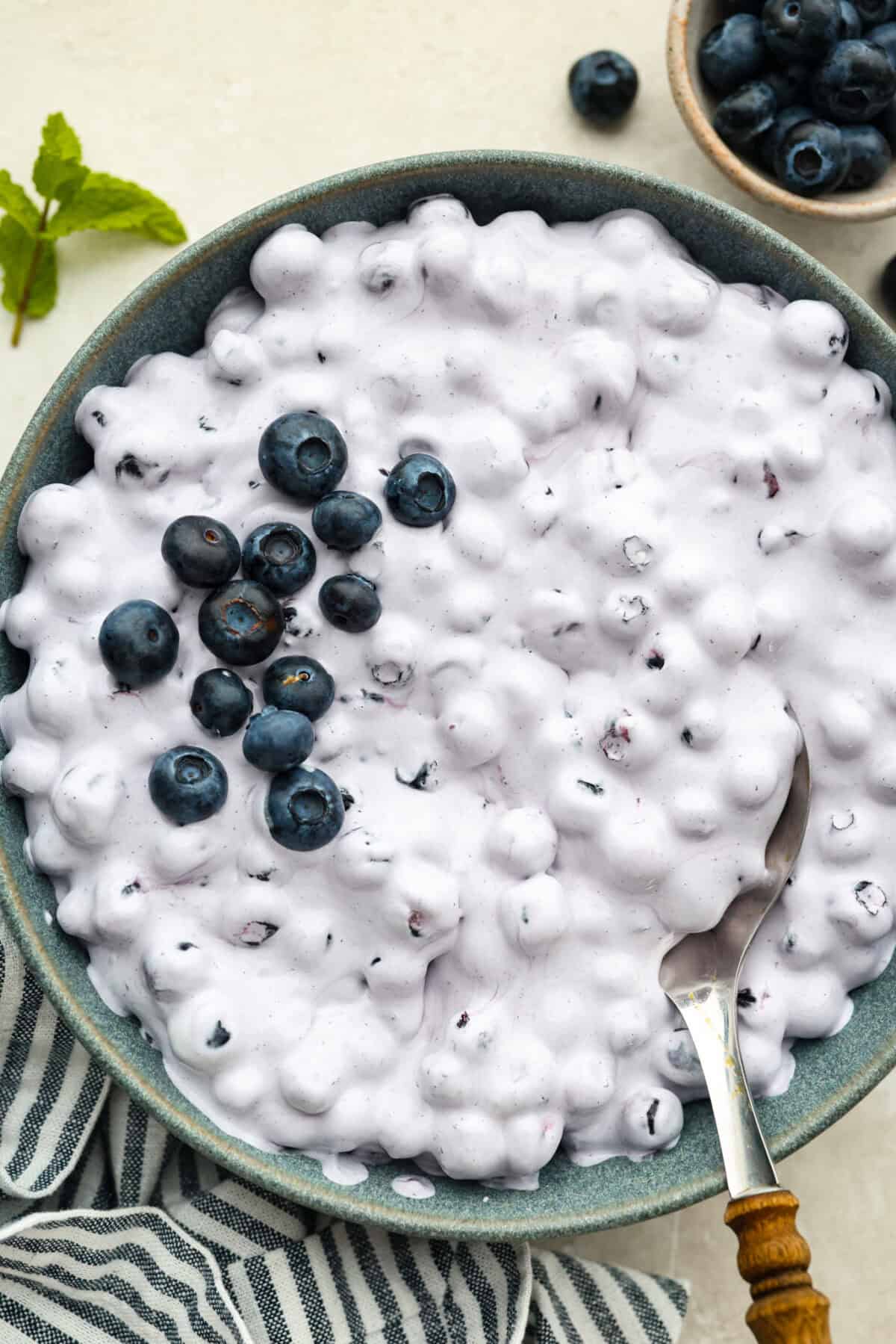 Large bowl of 3 ingredient blueberry fluff.