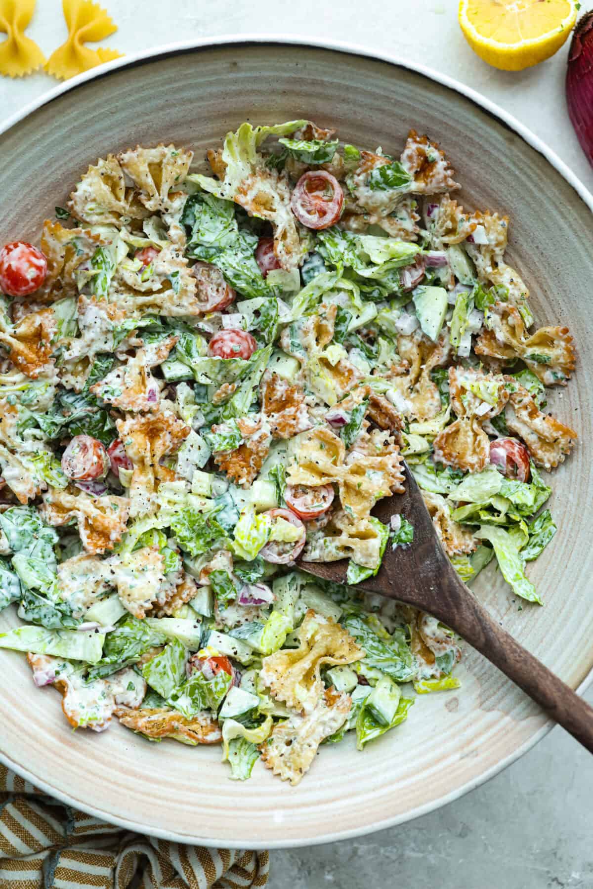 Large bowl of crispy pasta salad. 